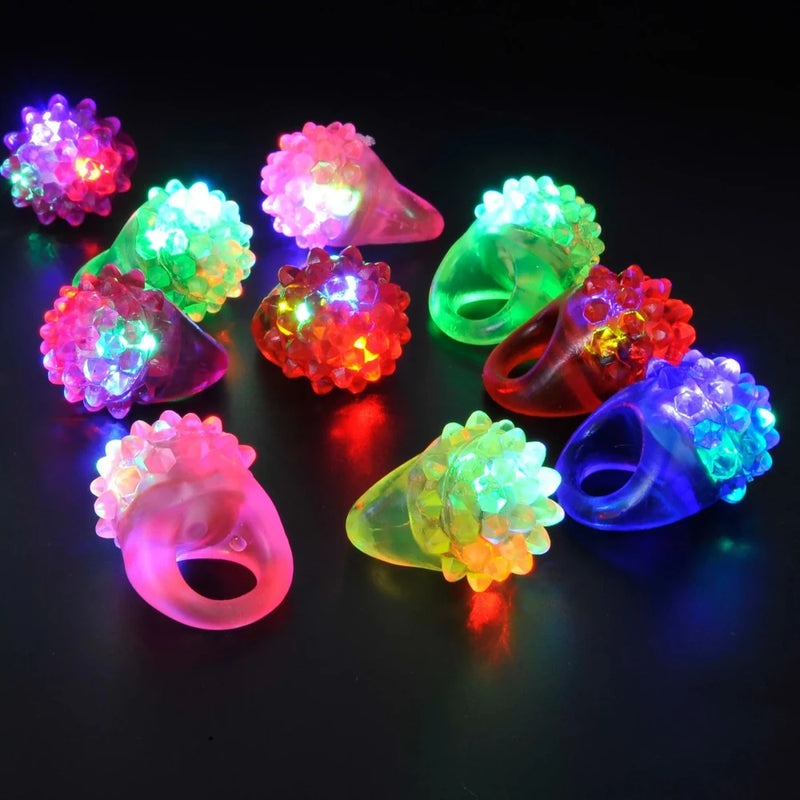 Colorful Light Up Jelly Rings for kids and adults, featuring soft spiked designs and glowing LED lights