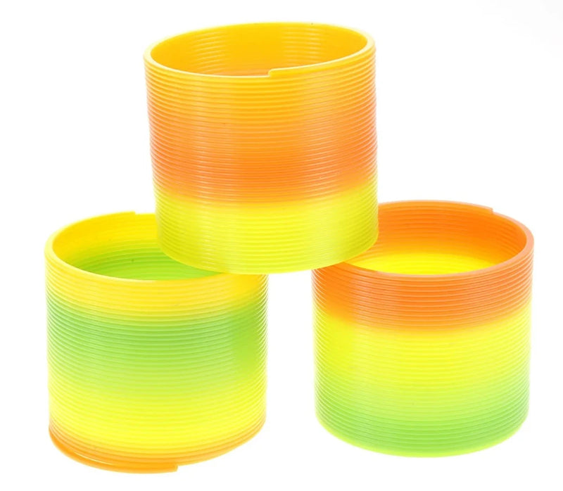 Colorful magic rainbow spring coils, including blue, purple, yellow, and green, for imaginative playtime