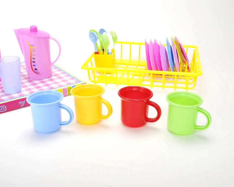 Set of colorful play tea cups in blue, yellow, red, and green for kids."

