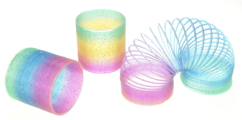 Colorful rainbow magic springs set, featuring flexible plastic springs for children’s entertainment and creativity.