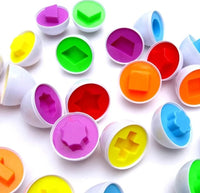 Colorful shape-matching eggs toy featuring bright geometric shapes for educational play.