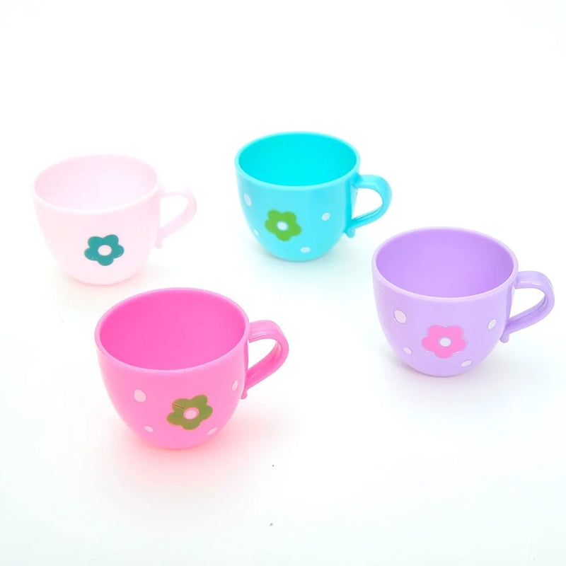 Set of colorful toy tea cups in pink, blue, purple, and pastel shades, perfect for toddler tea party play