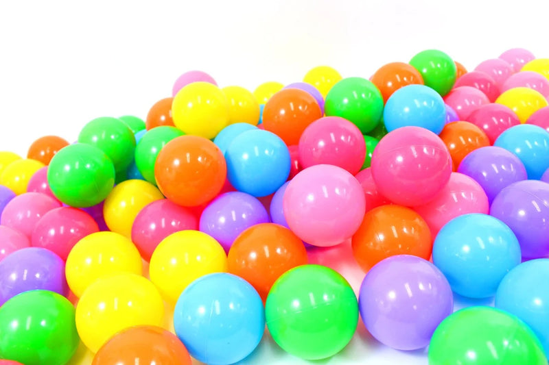 A large collection of crush proof ball pit balls in vibrant colors, suitable for commercial ball pits and dog-friendly