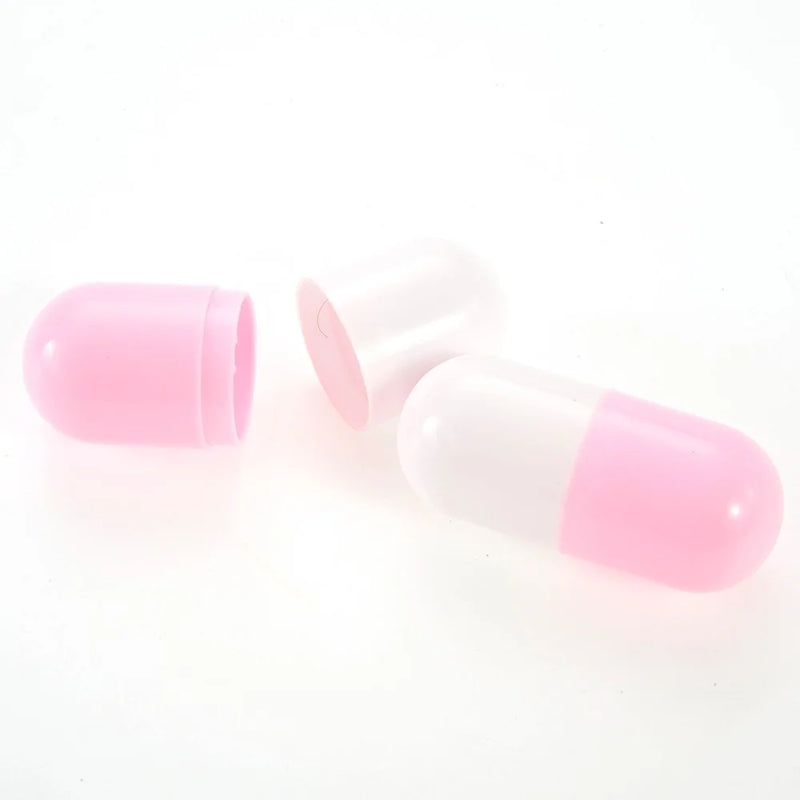 Toy capsule from a doctor play set, designed for pretend medication role-play