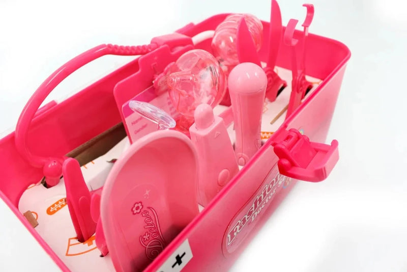 Pink doctor play set with health examination form, medical tools, and carrying case for kids