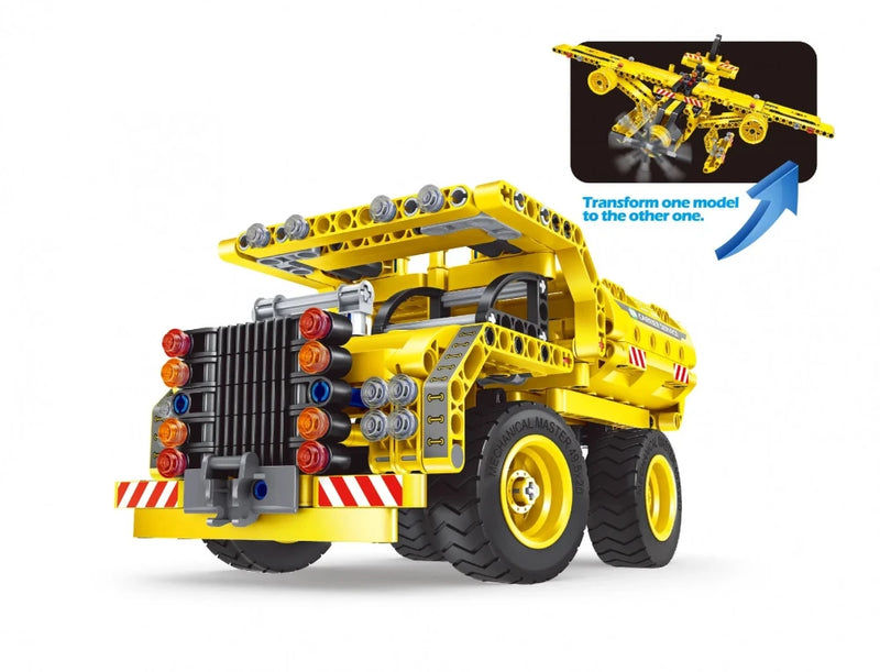 Assembled model of a toy dump truck with vibrant yellow design, great for construction play.
