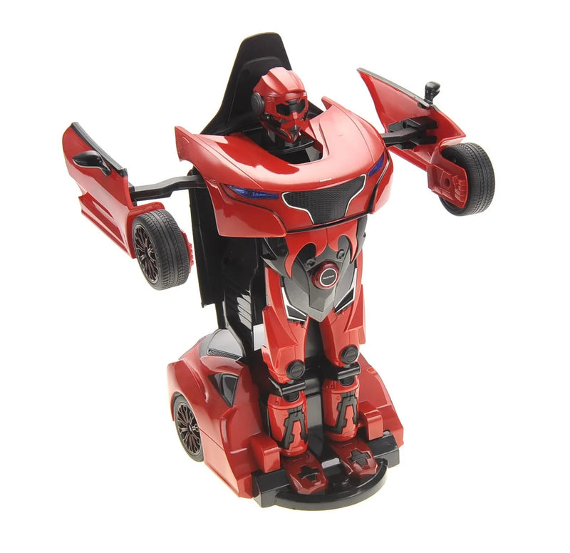 Red and black robot toy transforming from a car-like vehicle to a robot form on a white background