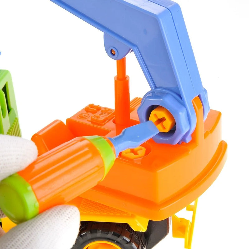 Close-up of assembling an excavator toy truck with a screwdriver tool, part of a take-apart toy set