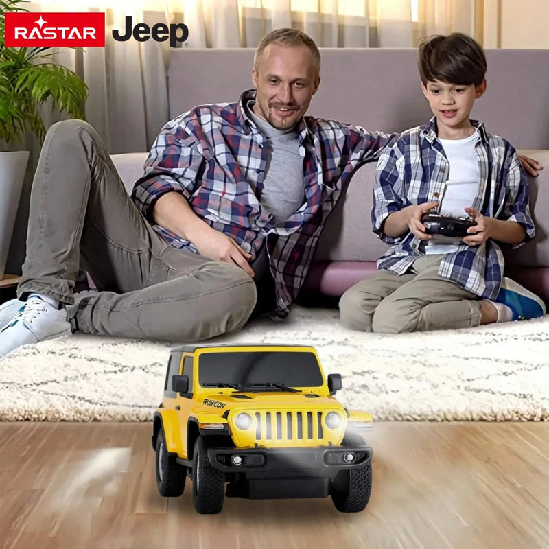 Father and son playing with Jeep Wrangler RC car, bonding over remote control toy