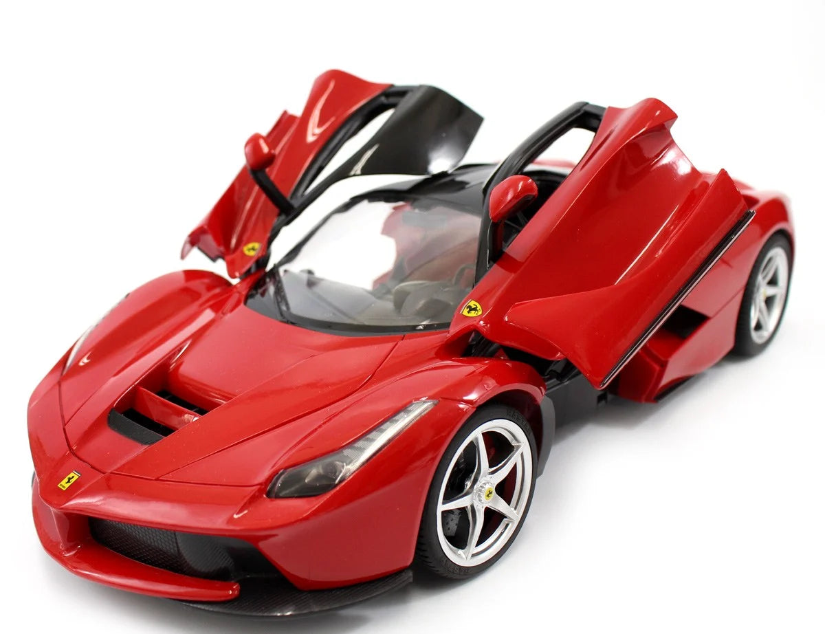 Red sports car model with open doors on a white background