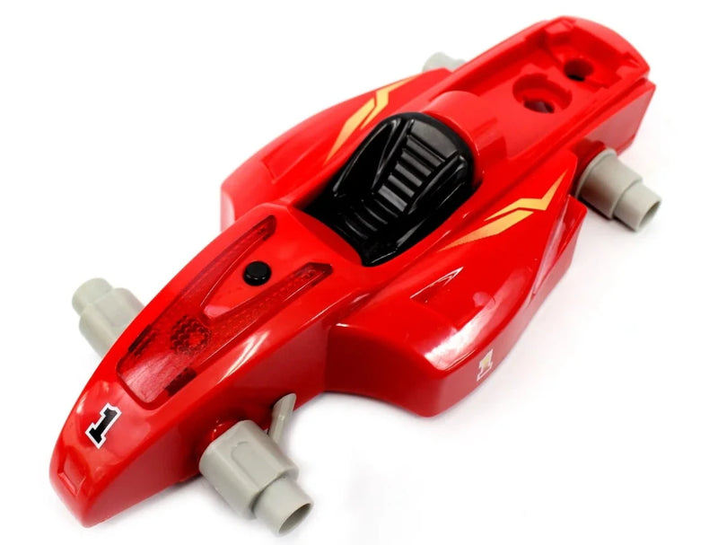 Close-up of the Formula 1 toy car body in red, showcasing cockpit and aerodynamic shape