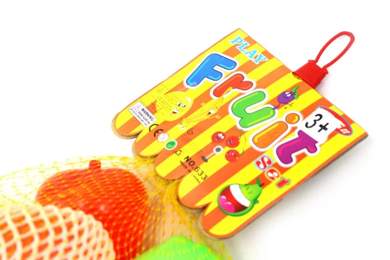 Label for fruit play set, designed for ages 3 and up, with colorful graphics of fruits and CE certification.