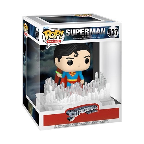 Superman Pop! vinyl figure in packaging with cityscape background