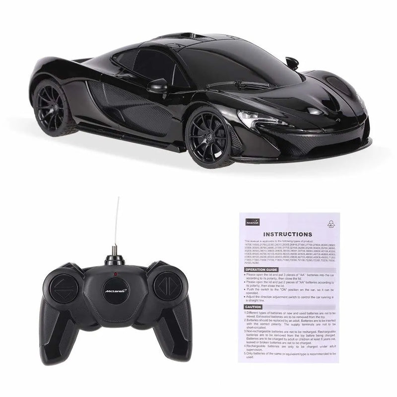 Black toy car with remote control and instructions on a white background