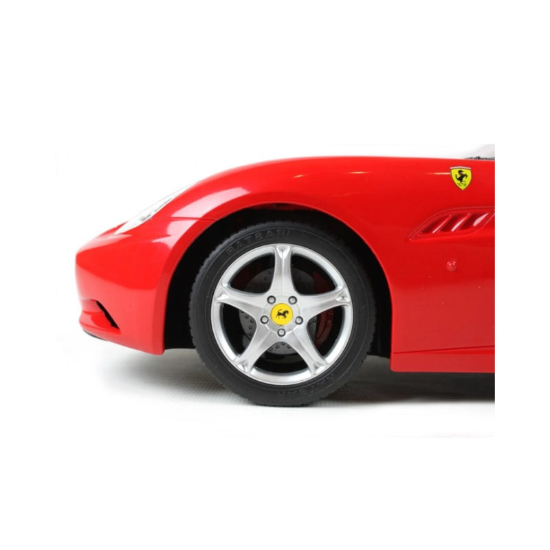 Red Ferrari car with a white background
