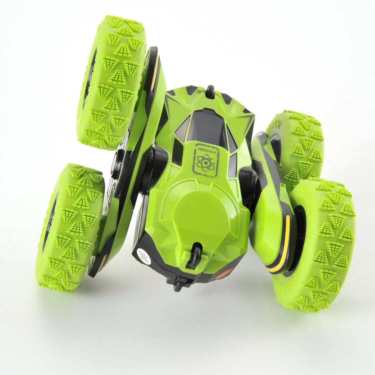 Green toy vehicle with four wheels on a white background