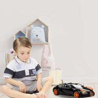 Child playing with the RC Bugatti, featuring a realistic design that brings excitement and joy to young drivers.