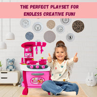 Happy child playing with a fast food play set kitchen, perfect for endless creative fun