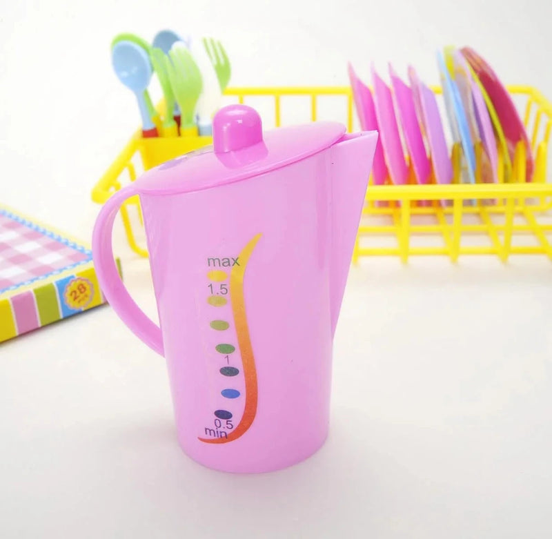 Pink teapot for kids play tea set, featuring measurement markings on the side