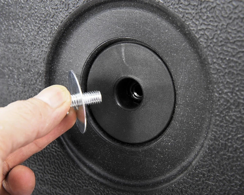 Close-up of screw being assembled on the base for kids punching bag with stand