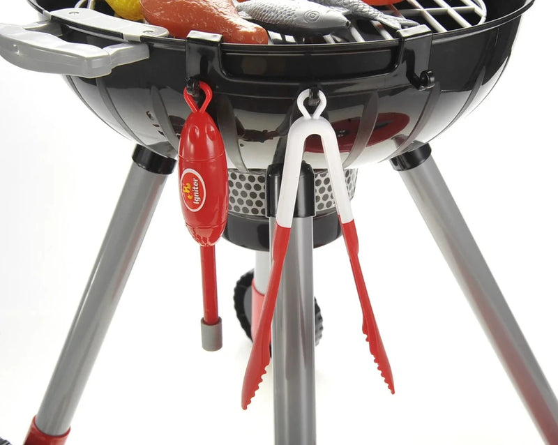 Kids barbecue toy tools including tongs and lighter, designed for pretend play BBQ setup.