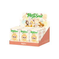 Display of 'Have A Seat' baby products with cartoon characters on a white background