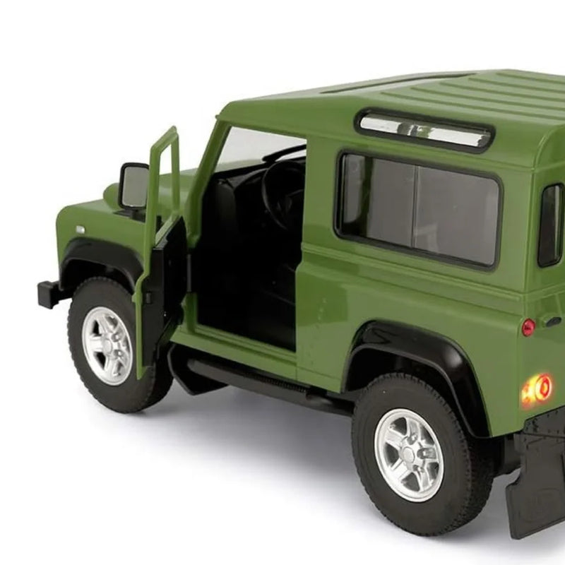 Side view of the Land Rover Defender RC car with open doors, detailed interior, and realistic design