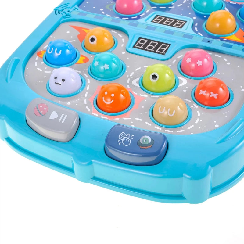 Close-up of Learning Fun Space War Game's control panel with light-up buttons and fun, colorful characters