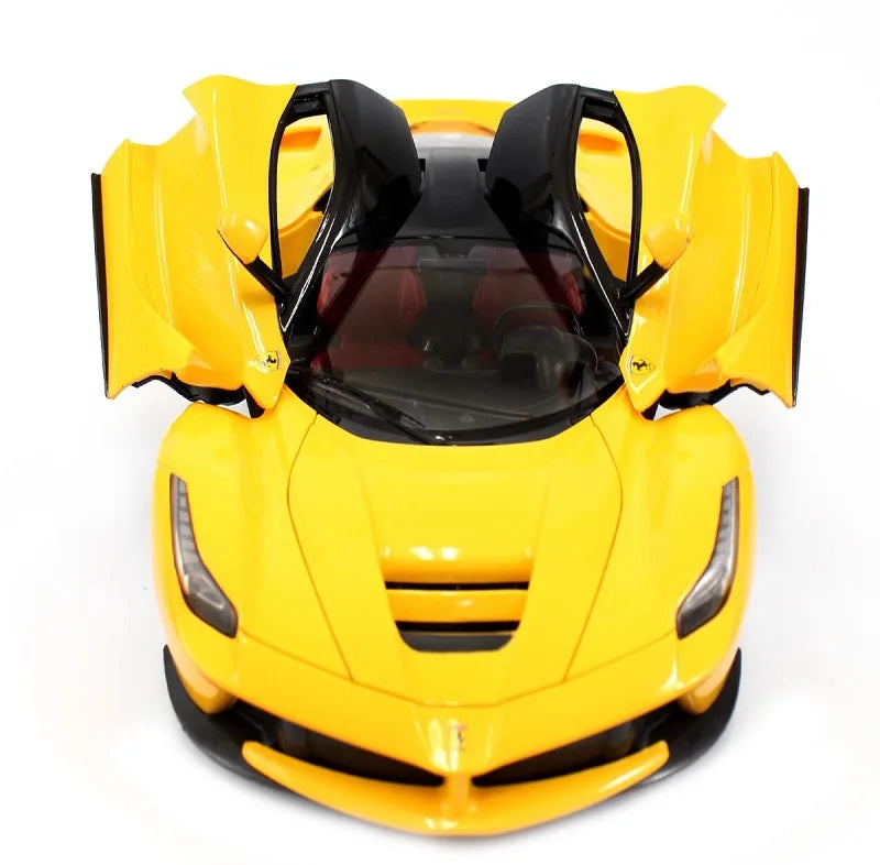 Yellow toy car with open doors on a white background
