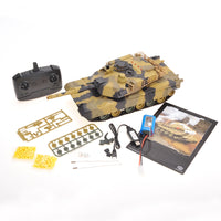 Model tank kit with components and remote control on a white background