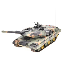Toy tank model with camouflage design on a white background