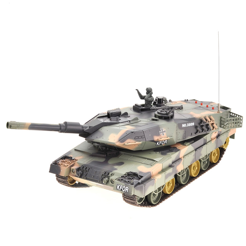 Toy tank model with camouflage design on a white background