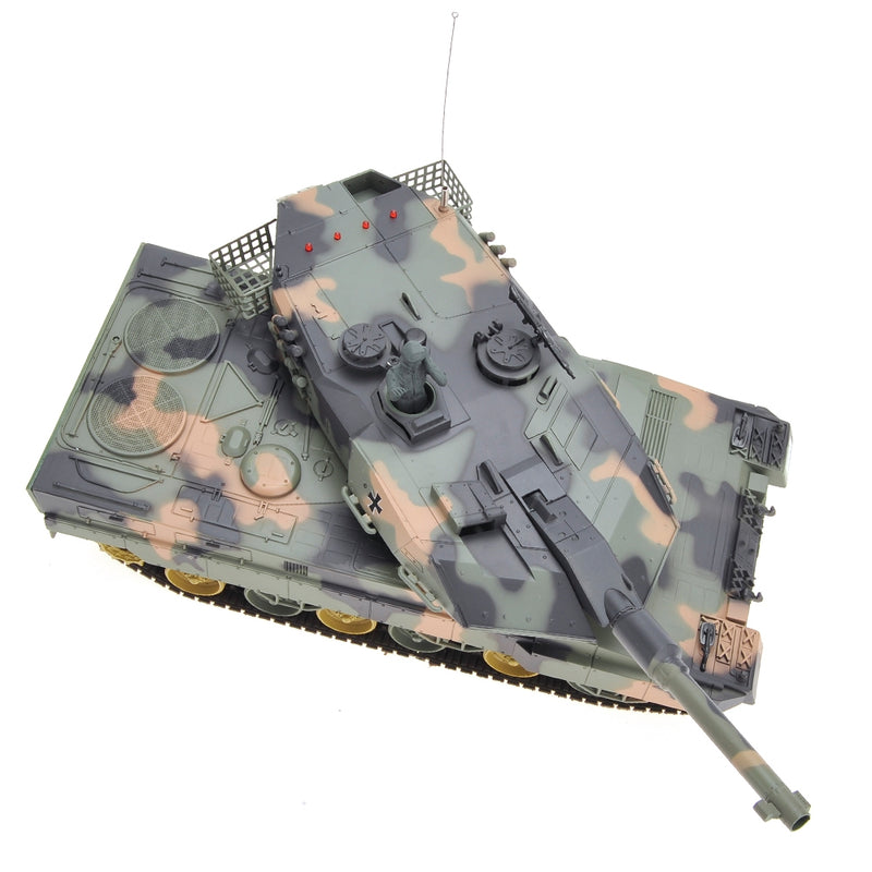 Camouflage toy tank on a white background