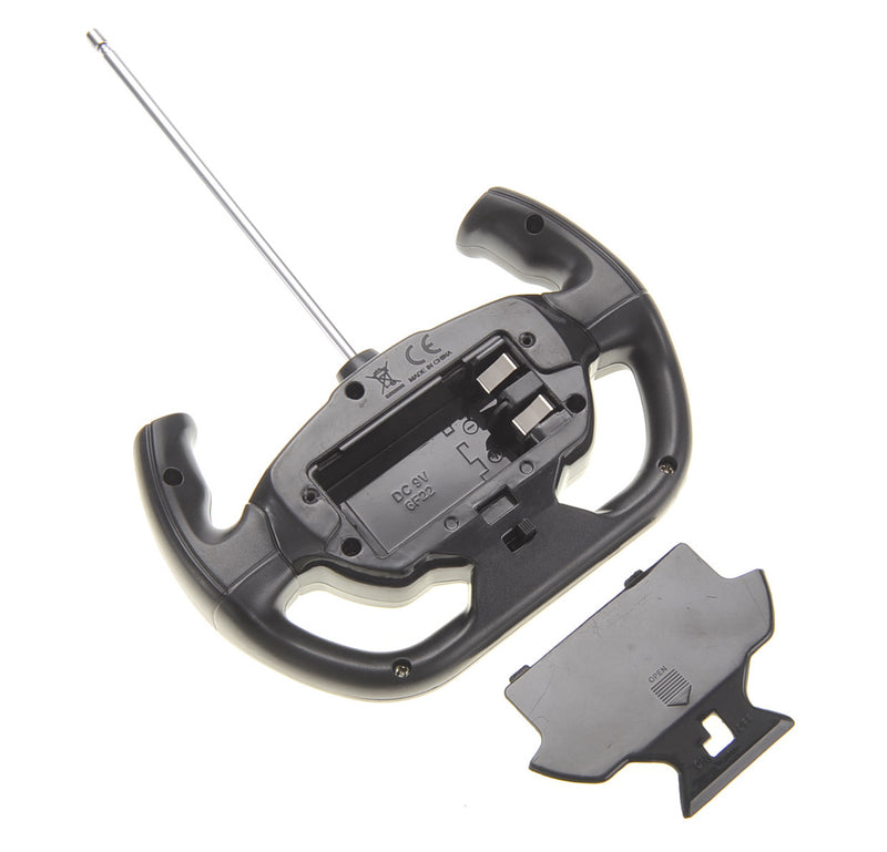 Black plastic tool with a metallic rod on a white background