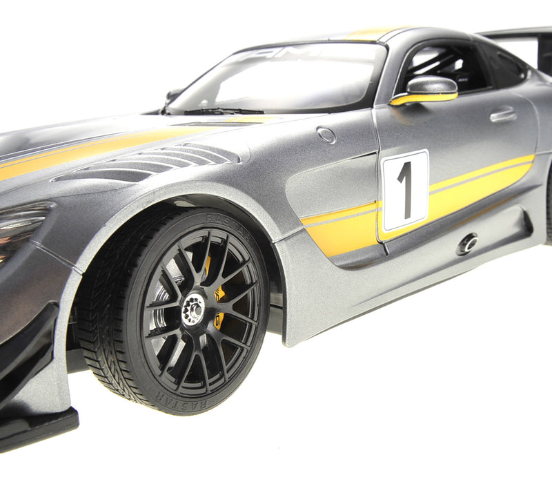 Silver sports car with yellow stripes and number 1 on a white background