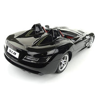 Black toy car with SLR branding on a white background