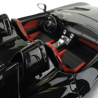 Close-up of a car's interior with red and black seats on a white background