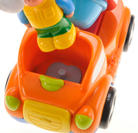 Colorful toy car with a character on top against a white background