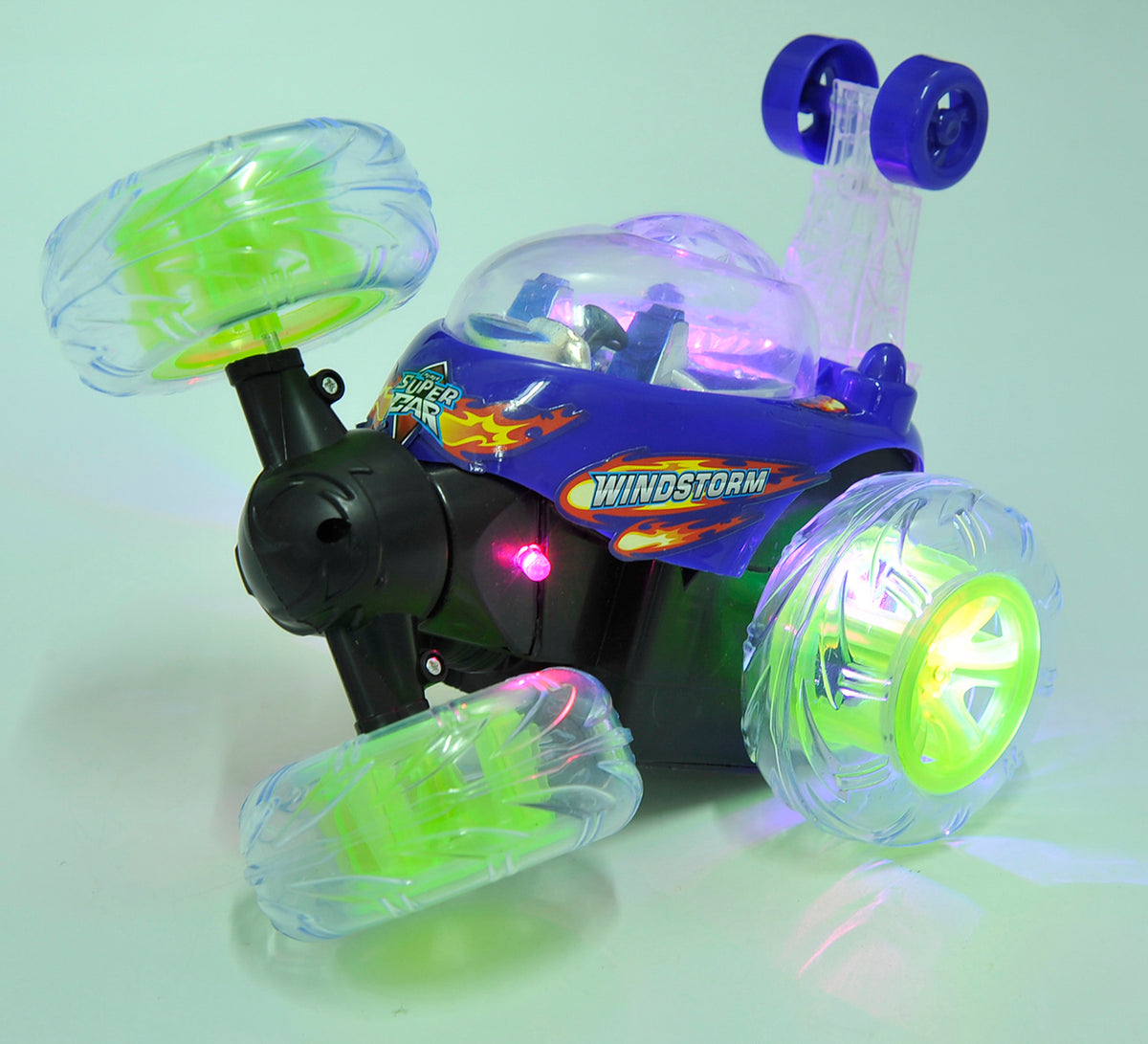 Toy car with LED lights and colorful design on a light background