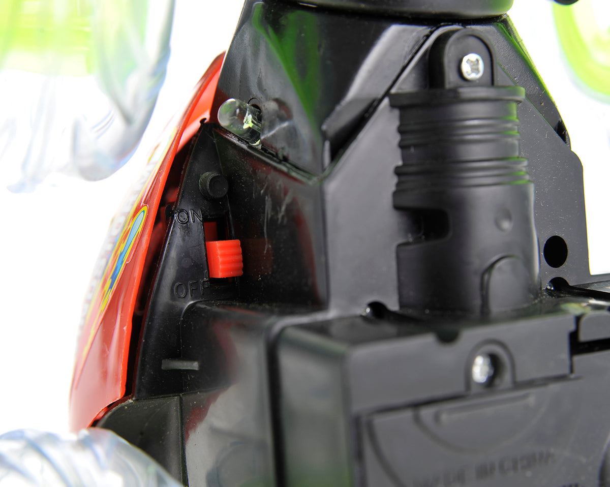 Close-up of a lawn mower engine with visible components.