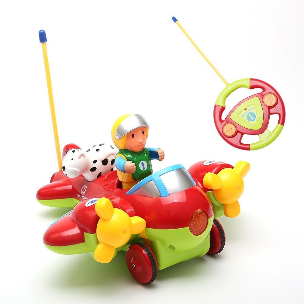 Colorful toy airplane with a pilot figure and remote control on a white background