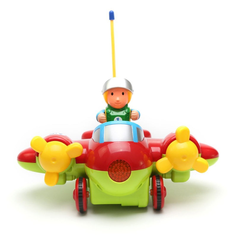 Colorful toy airplane with a pilot figure on a white background
