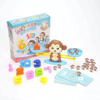 Monkey Balance educational toy set with box, colorful numbers, and monkey scale for fun math learning.