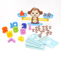 Monkey Balance toy set with colorful numbers, mini monkey figures, and math cards for educational play