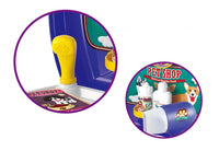 Close-up view of My Little Pony Pet Shop toy accessories, including brush and shampoo bottles.