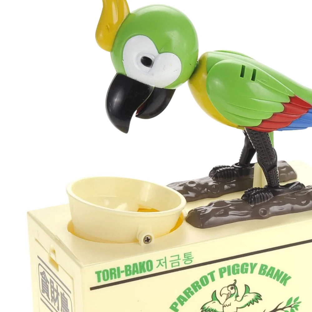 Close-up of green parrot toy piggy bank eating a coin, featuring a bowl and detailed colorful feathers