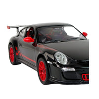 Black sports car with red accents on a white background