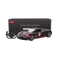 Porsche 918 Spyder remote control car with controller and packaging box, featuring elegant design