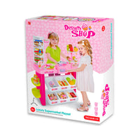  Two girls playing with a pretend play supermarket set featuring a cash register and food.