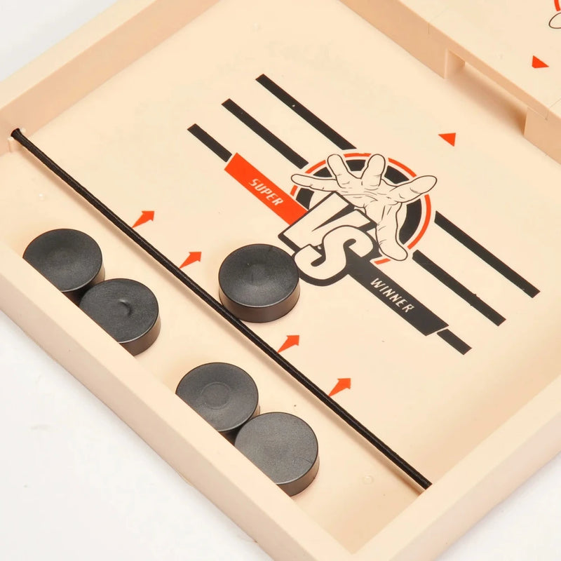 Quick Sling game board for fast reflex and puck-shooting competition with strategic positioning